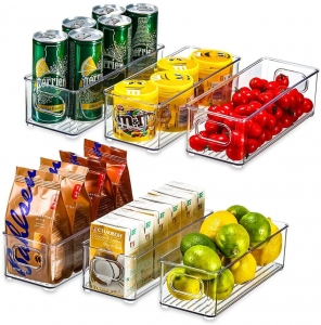 refrigerator organizers filled with drinks and snacks.